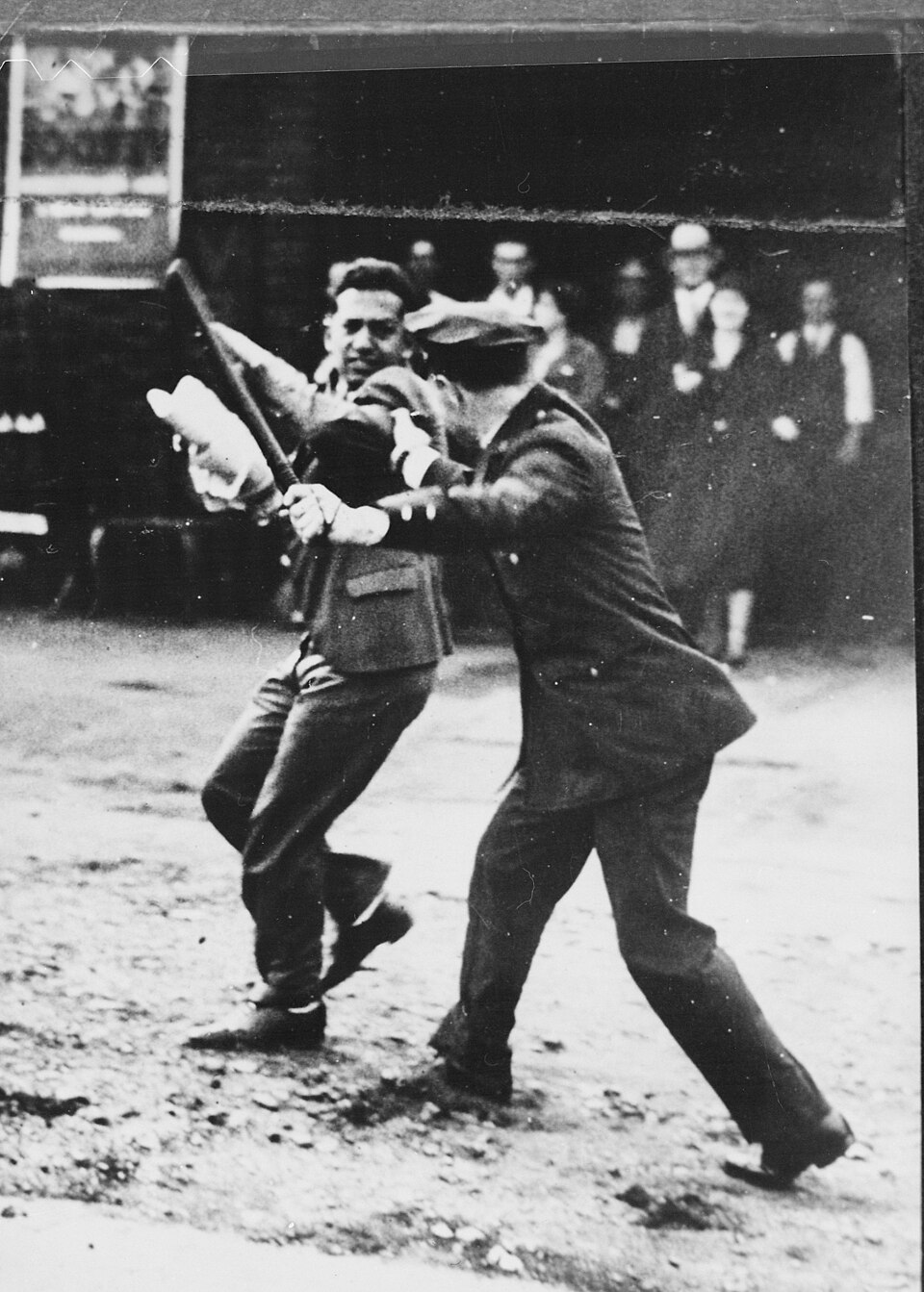 Confrontation_between_a_policeman_wielding_a_night_stick_and_a_striker_during_the_San_Francisco_General_Strike,_1934_-_NARA_-_541926 Confrontation between a policeman wielding a night stick and a striker during the San Francisco General Strike 1934 NARA 541926
